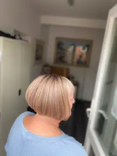 Classic blonde bob with natural-looking tones and precision cut, styled by our hair colouring Bognor Regis team.