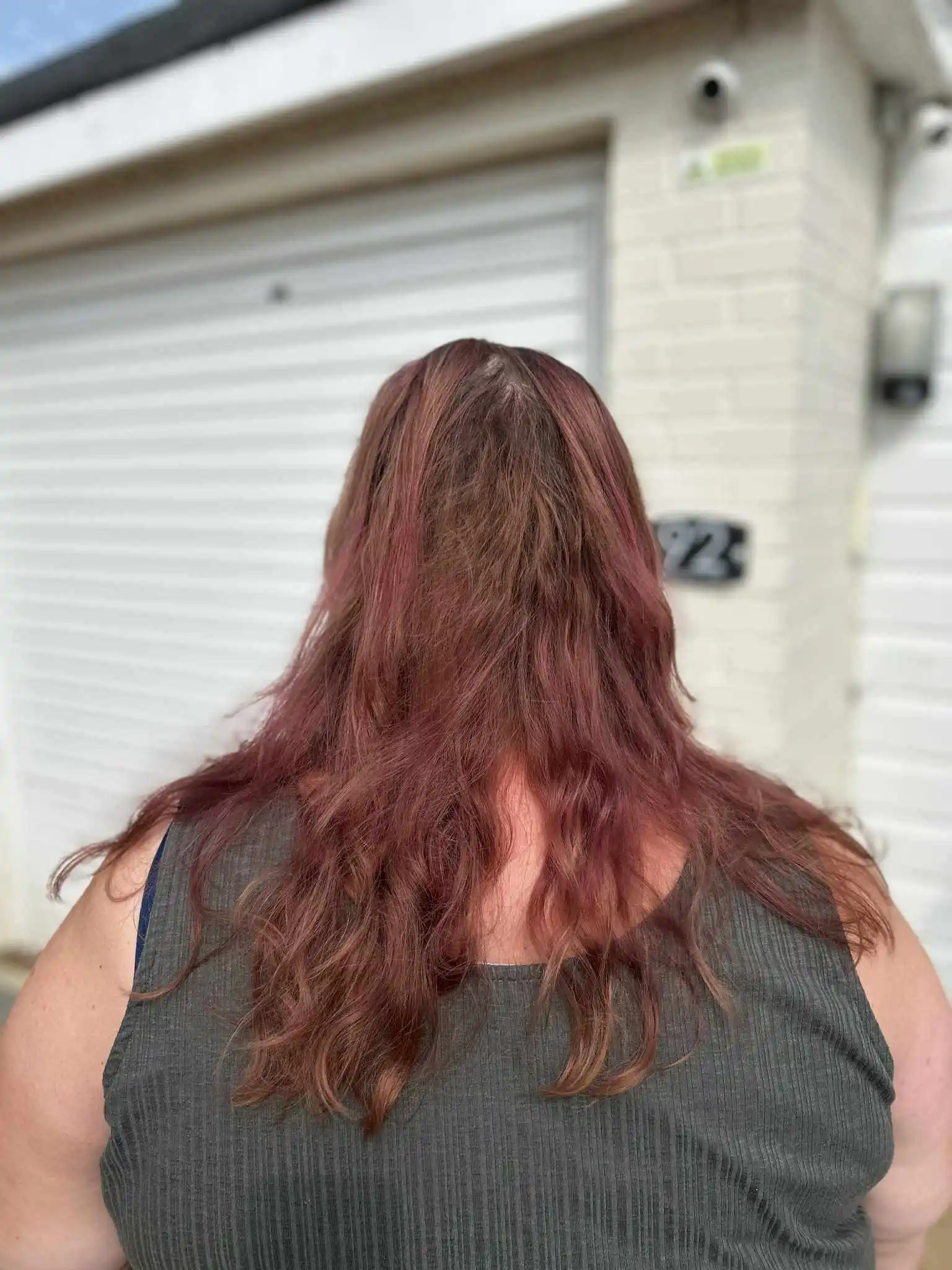Faded red hair before a colour correction at our Bognor Regis salon.